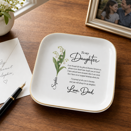 Jewelry dish displayed on a refined desk with a handwritten envelope and fountain pen