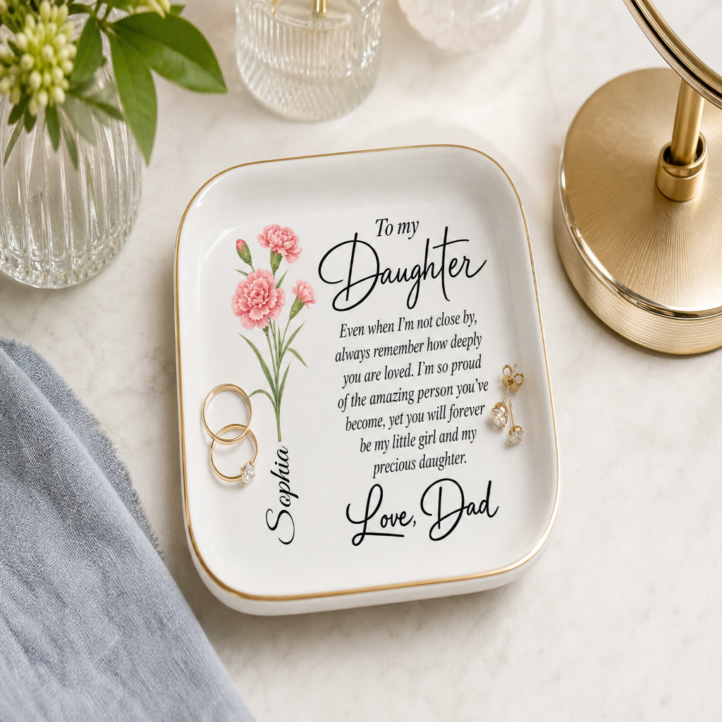 Dad-specific personalized jewelry dish displayed on an adult daughter’s vanity with rings and earrings